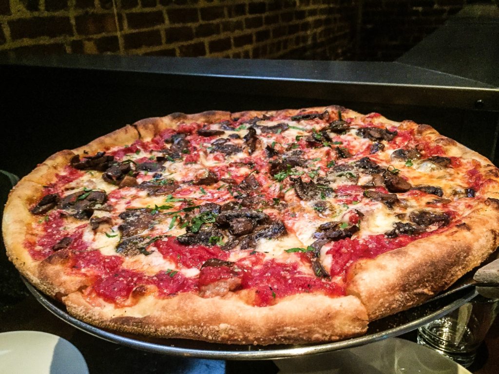 CALABRESE $24 thick cut pepperoni, fennel sausage red onions, pomodoro, mozzarella